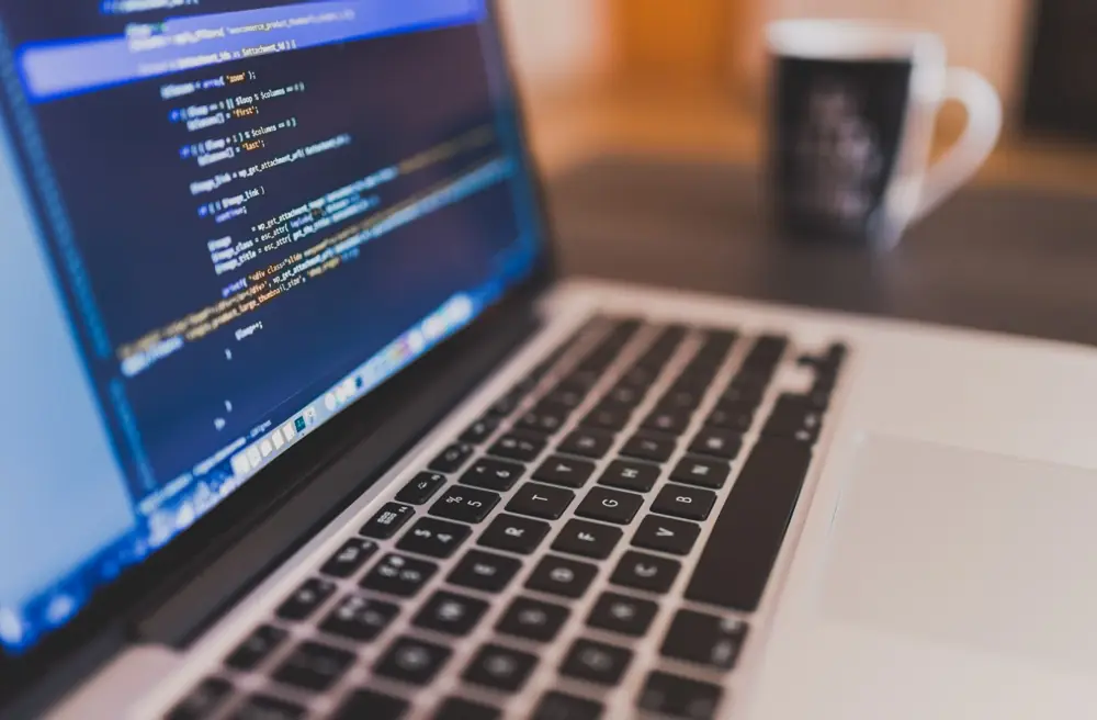 Source code on a laptop screen